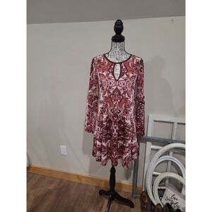 Haani Women's SZ Sm. Abstract flirty knit mini dress w/trumpet sleeves retro 70s